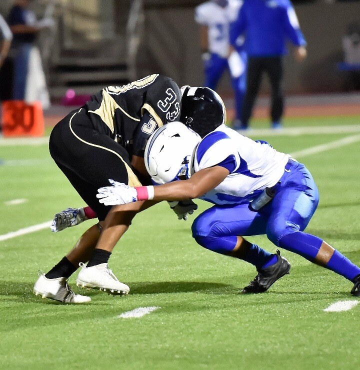 Football players head-on collision